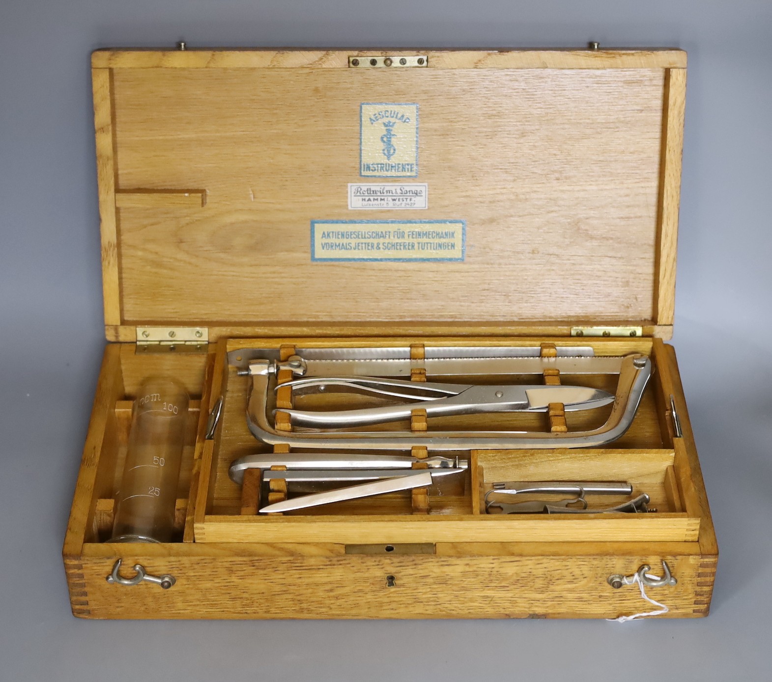 An Aesculap oak cased German autopsy kit